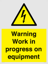 warning-work-in-progress-on-equipmentwith-electrical-hazard-symbol~